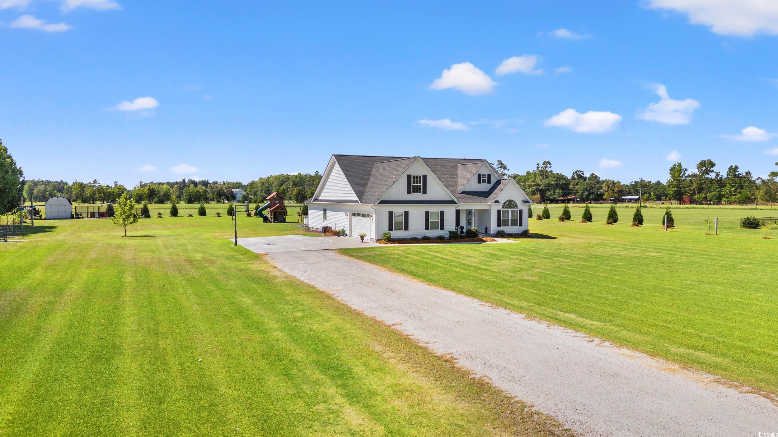 1333 Zion Road Aynor, SC 29544 - Photo 30 of 34 Cape cod-style house featuring a rural view, a fro