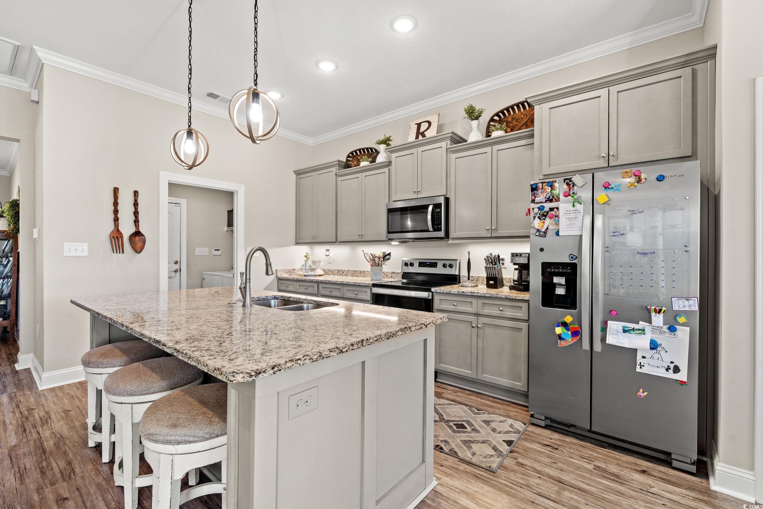 1333 Zion Road Aynor, SC 29544 - Photo 3 of 34 Kitchen featuring a center island with sink, light