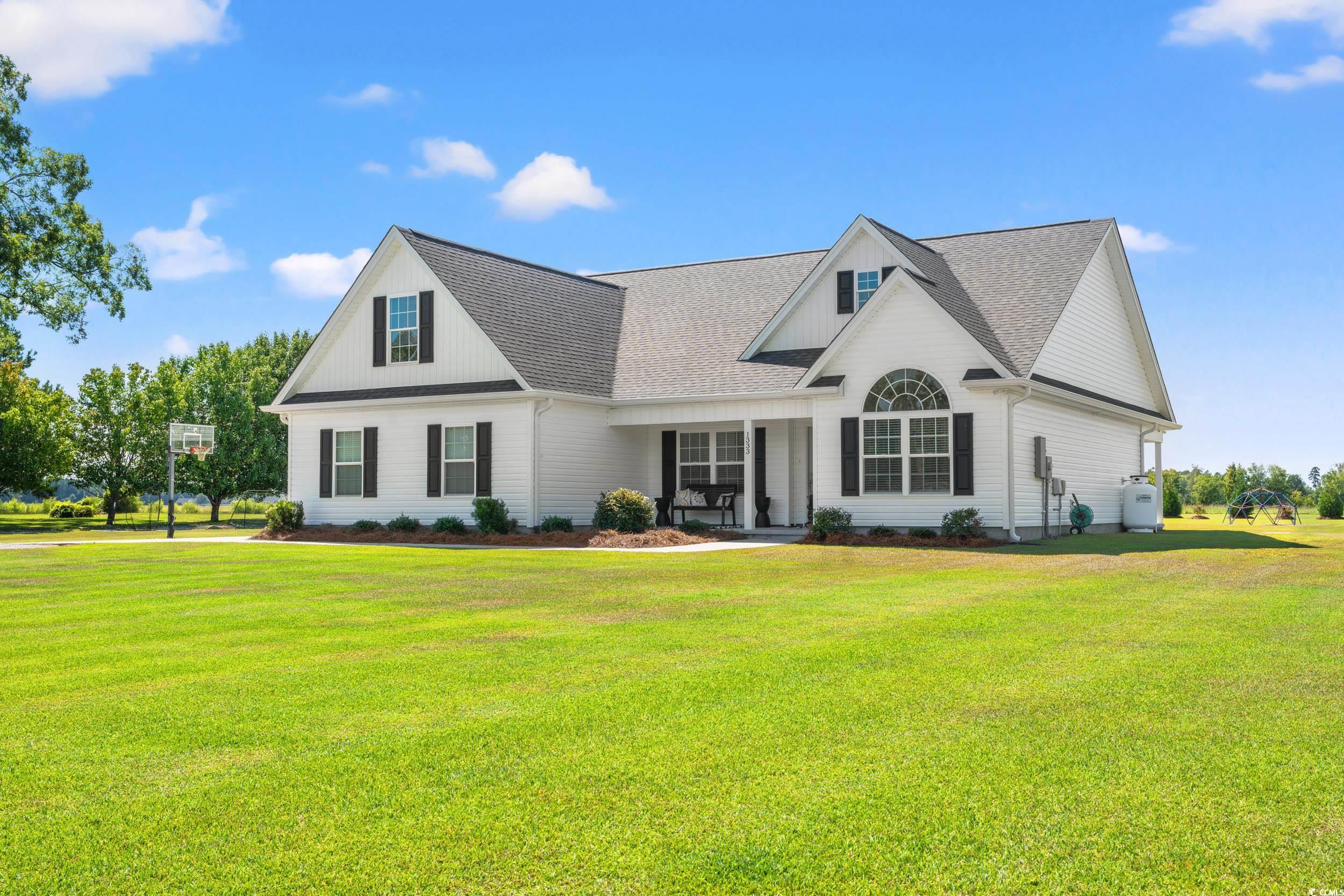 1333 Zion Road Aynor, SC 29544 - Photo 34 of 34 View of front facade with a front lawn