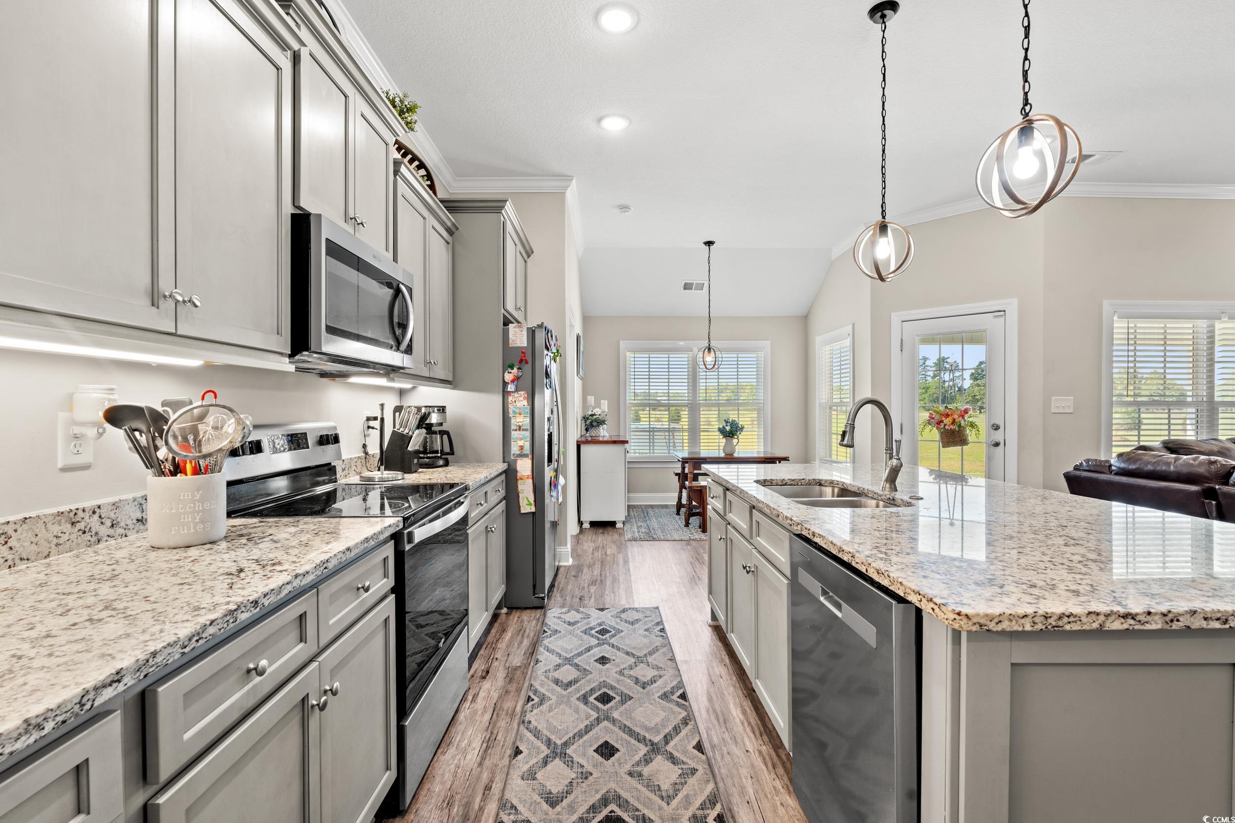 1333 Zion Road Aynor, SC 29544 - Photo 4 of 34 Kitchen featuring gray cabinetry, light hardwood /