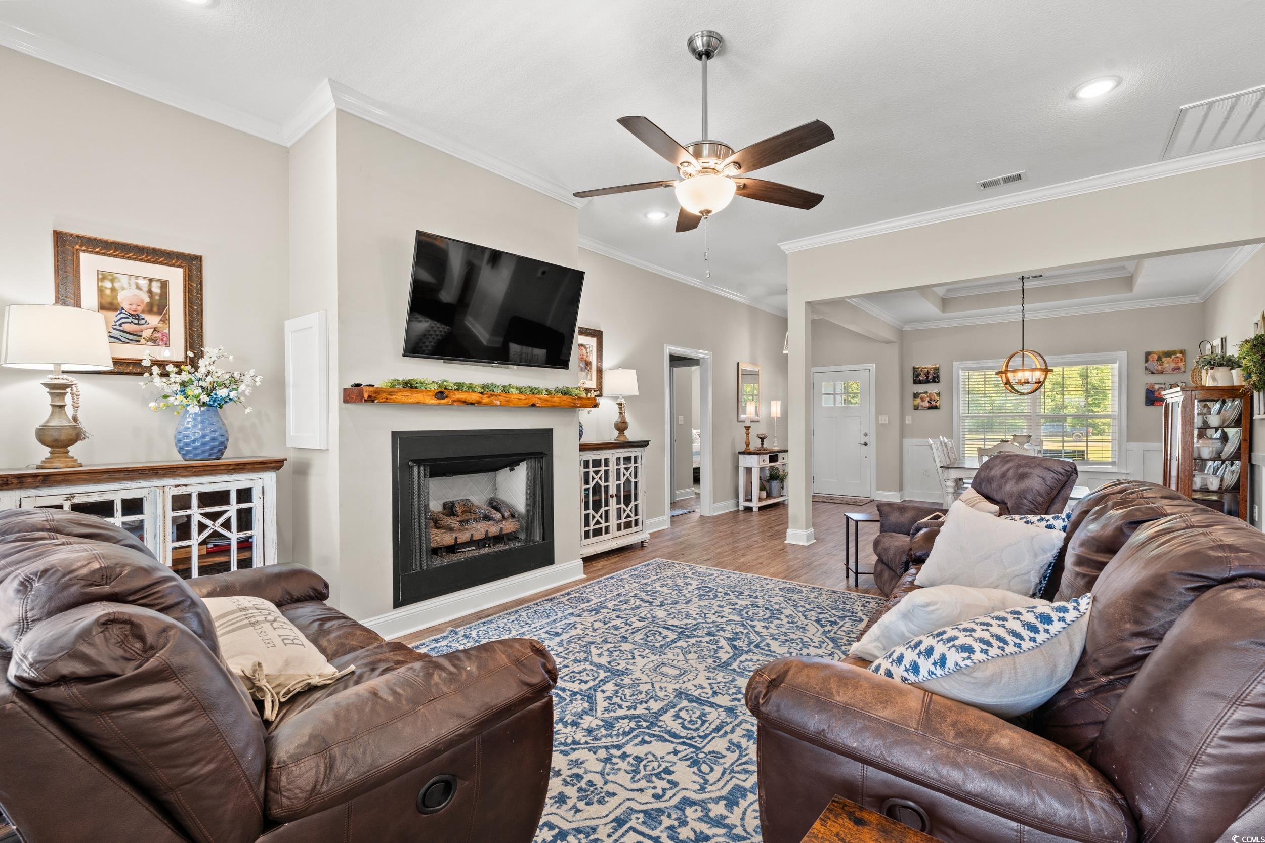 1333 Zion Road Aynor, SC 29544 - Photo 6 of 34 Living room featuring ornamental molding, light ha
