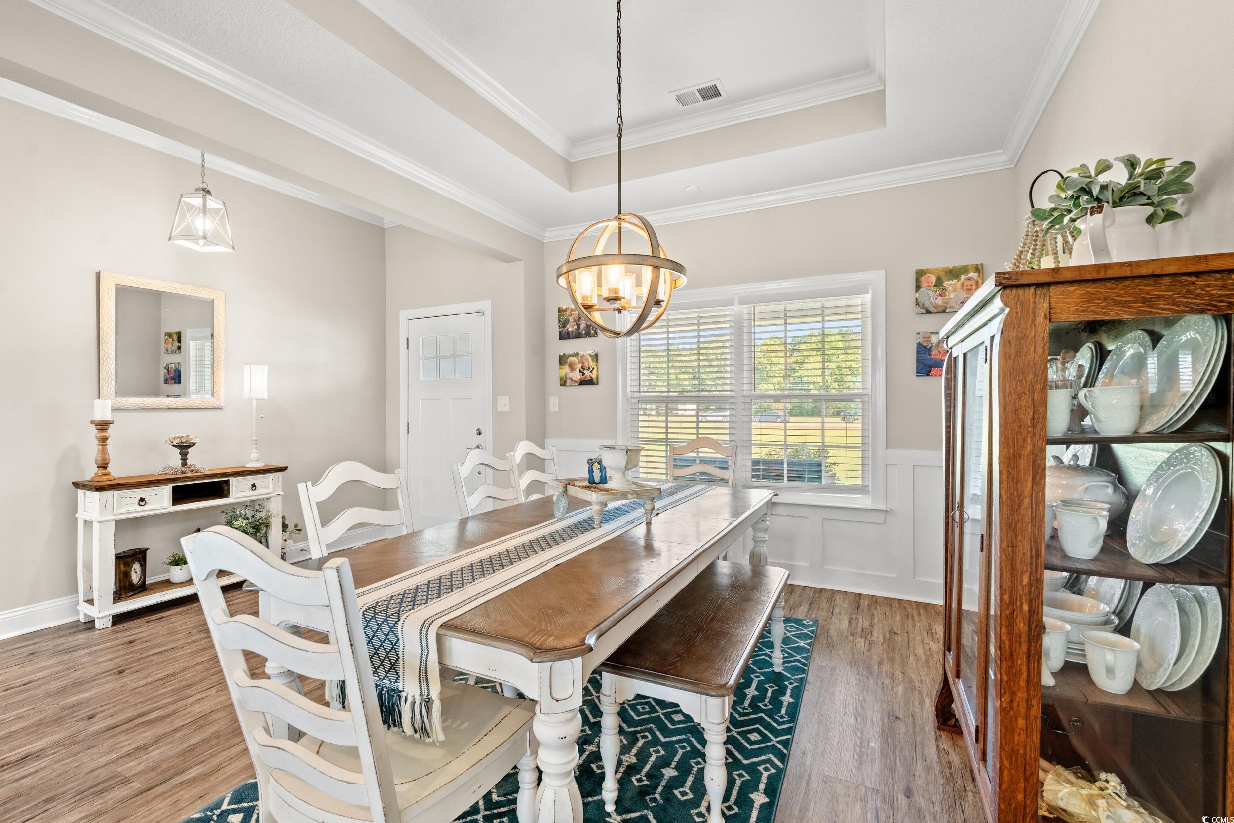 1333 Zion Road Aynor, SC 29544 - Photo 10 of 34 Dining space with ornamental molding, a raised cei