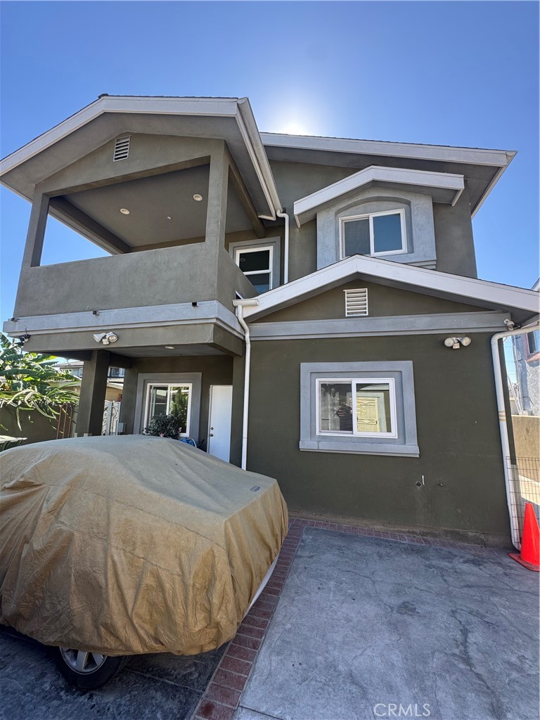 3533 West 109th Street, Unit 1/2 Inglewood, CA 90303 - Photo 12 of 26 a bedroom with a bed and a window