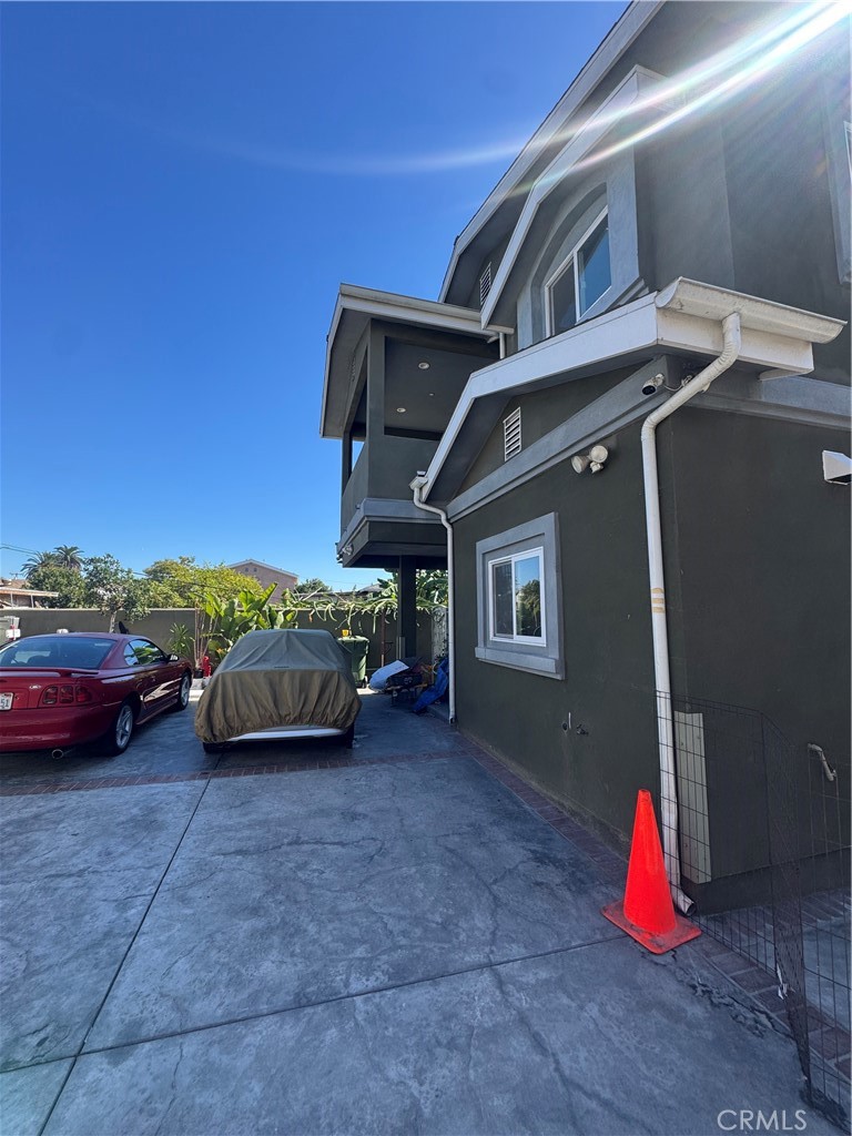 3533 West 109th Street, Unit 1/2 Inglewood, CA 90303 - Photo 14 of 26 a view of an outdoor space with parked cars