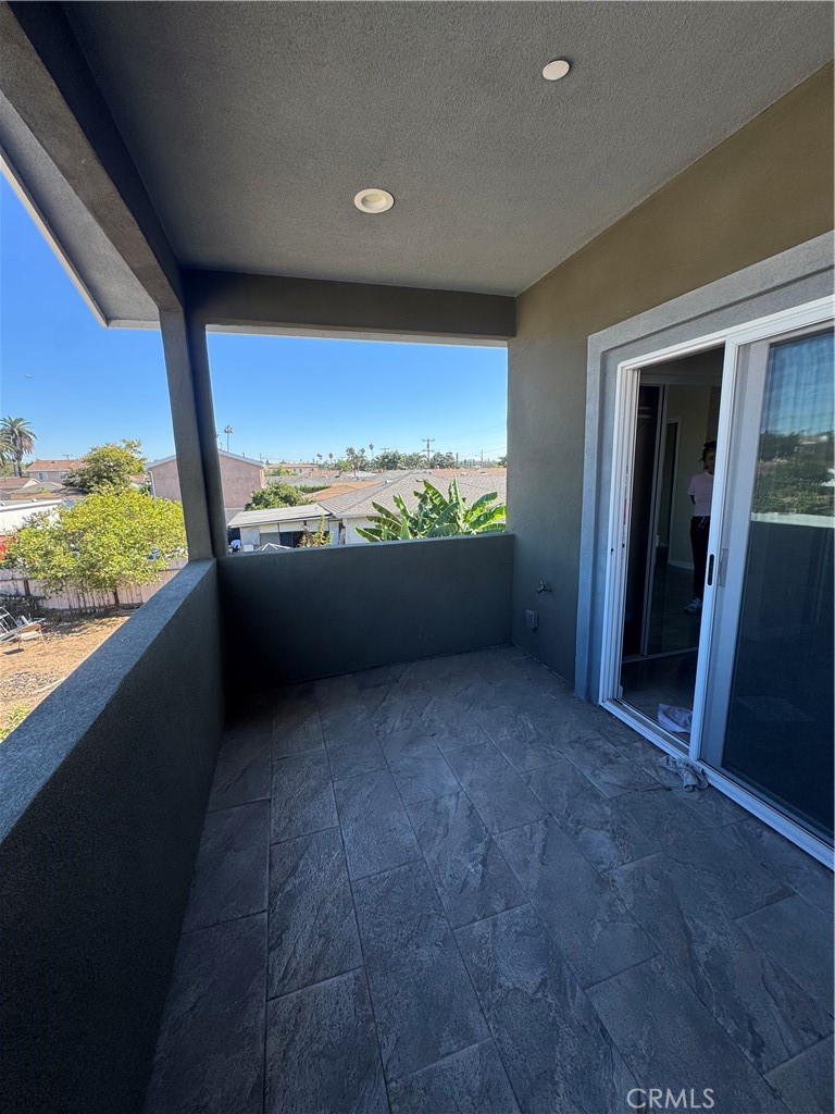 3533 West 109th Street, Unit 1/2 Inglewood, CA 90303 - Photo 21 of 26 an empty room with windows