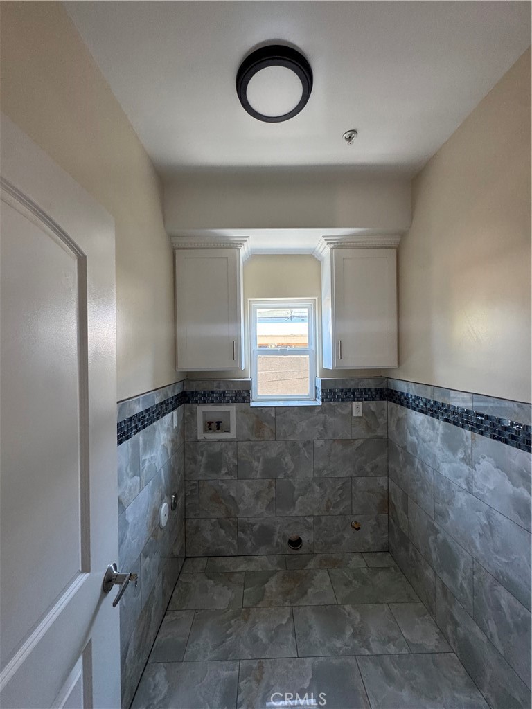 3533 West 109th Street, Unit 1/2 Inglewood, CA 90303 - Photo 26 of 26 a bathroom with a shower and a sink