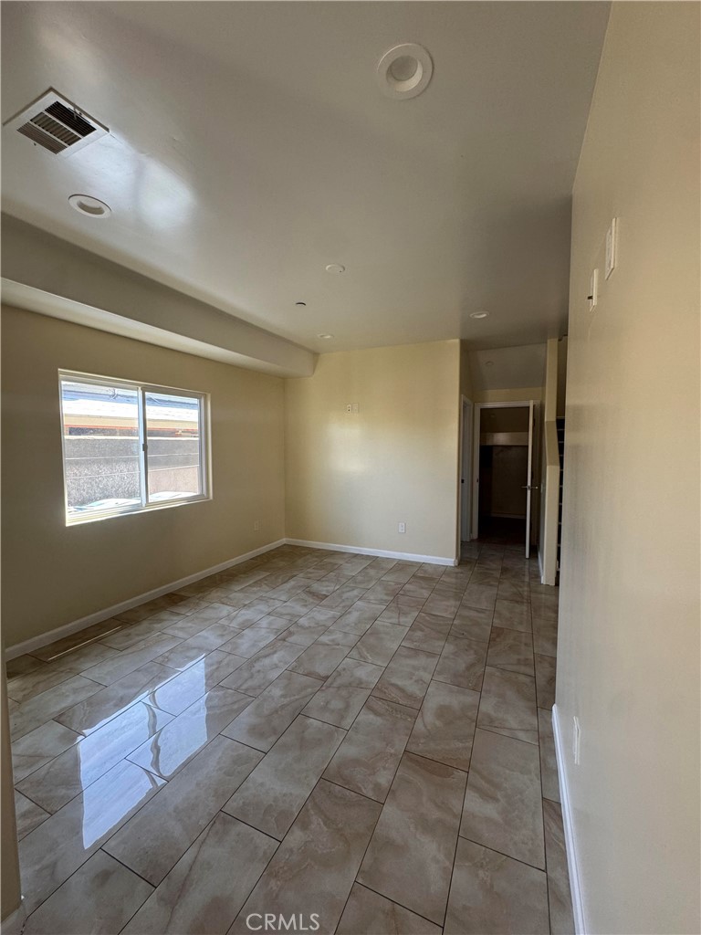 3533 West 109th Street, Unit 1/2 Inglewood, CA 90303 - Photo 7 of 26 a view of an empty room and window
