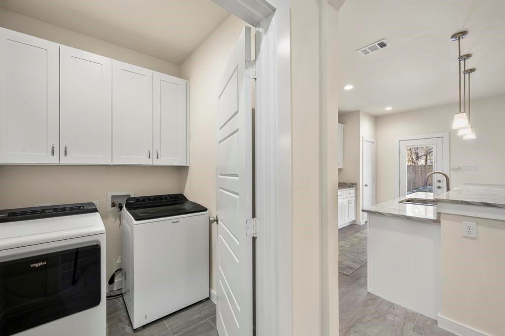2815 East Overton Road Dallas, TX 75216 - Photo 21 of 23 a view of a kitchen with electric appliances