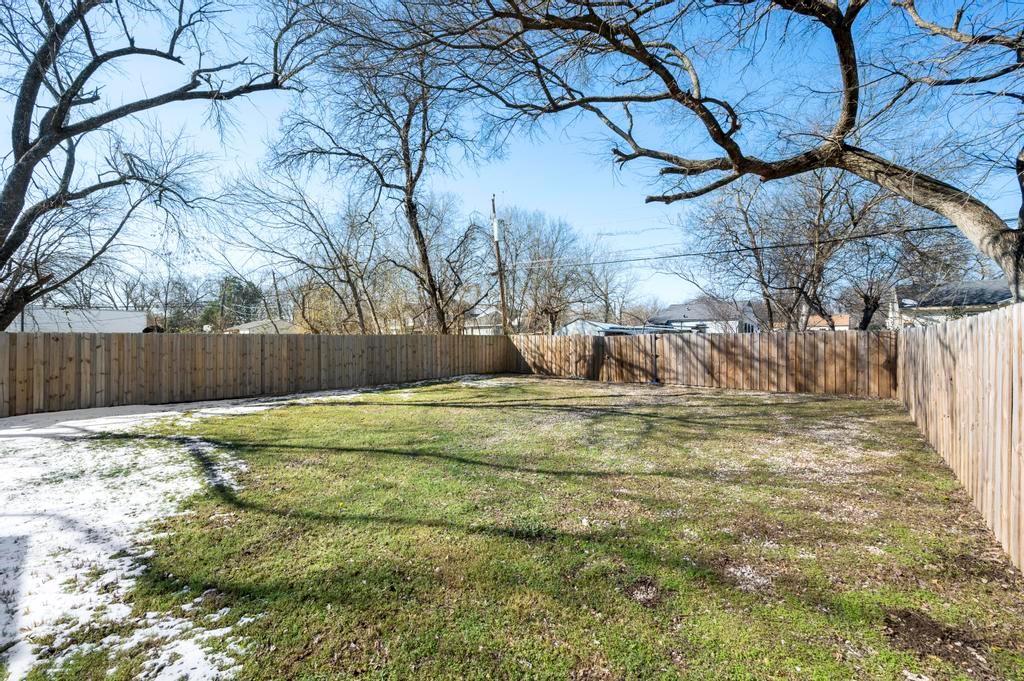 2815 East Overton Road Dallas, TX 75216 - Photo 23 of 23 a view of backyard with tree