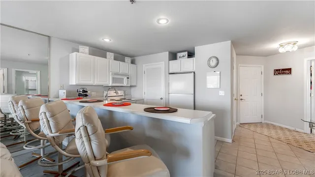 $347,500 | 28624 Gravois Village Lane, Unit 1301, Rocky Mount, MO 65072