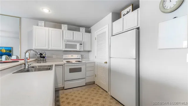 $347,500 | 28624 Gravois Village Lane, Unit 1301, Rocky Mount, MO 65072