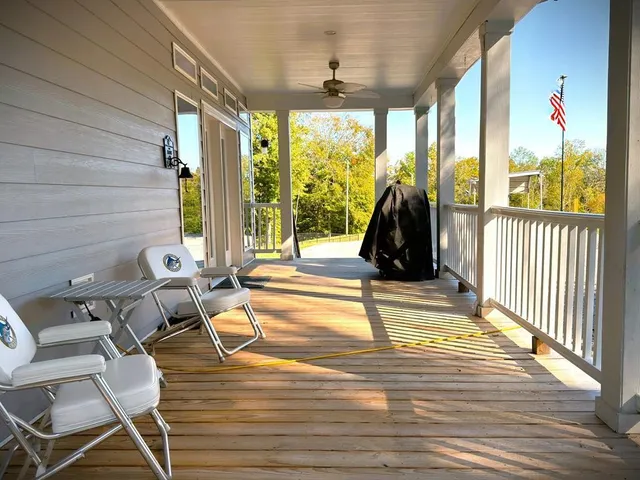 a view of swimming pool with seating space