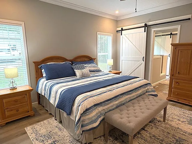 a bathroom with a shower curtain and a sink