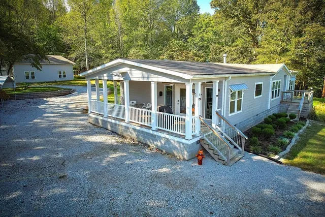 a view of sitting area in front of house