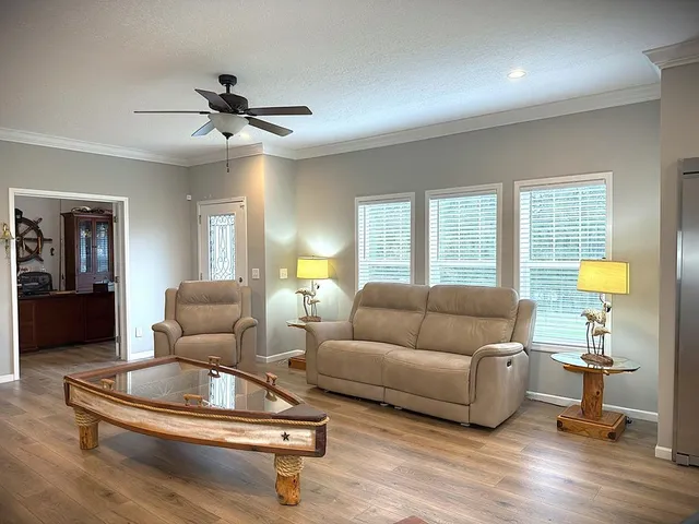 a view of backyard with window and swimming pool