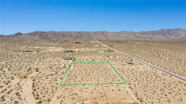 a view of ocean and mountain