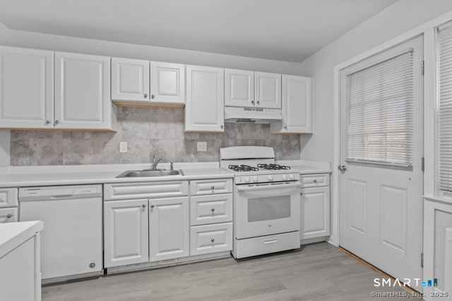 Photos are of another unit, same layout. Finishes may vary.