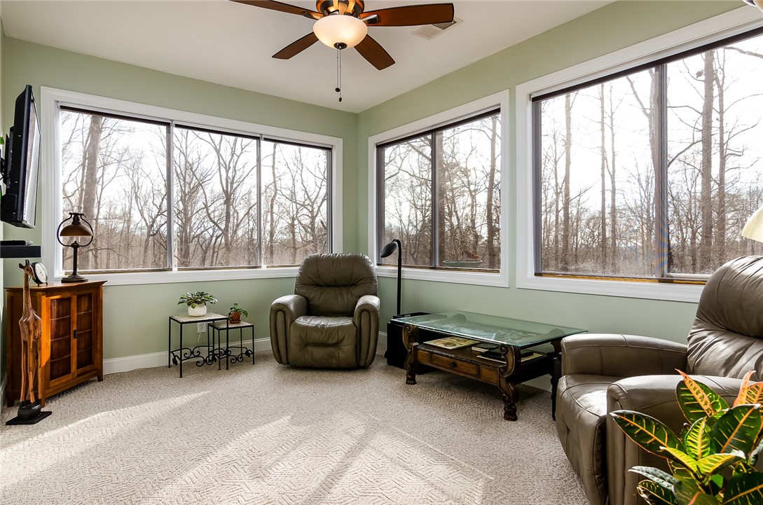 219 North Foxglove Road Westminster, SC 29693 - Photo 21 of 43 Let the light shine in this cozy sun-room.
