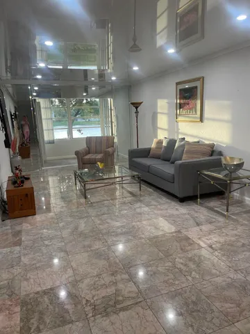 a bathroom with a sink and vanity