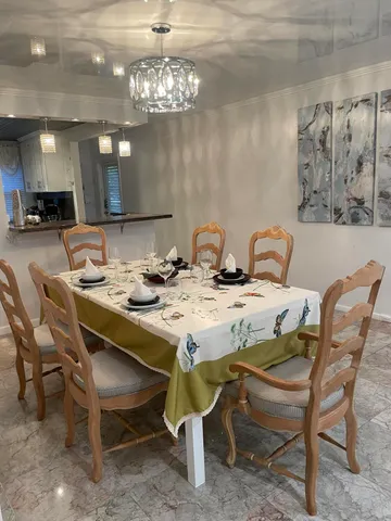 an aerial view of a house with a lake view