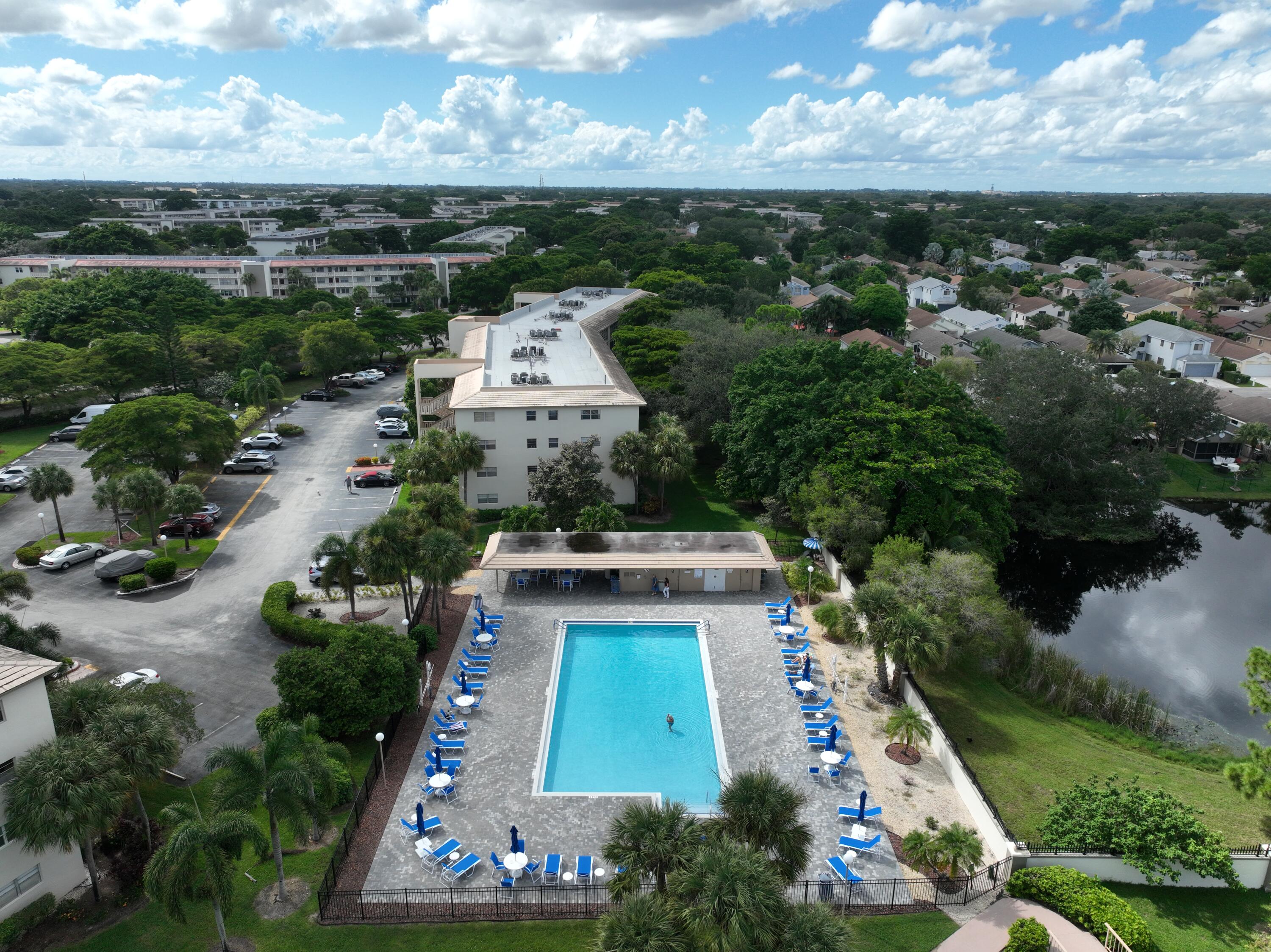 1904 Bermuda Circle, Unit H1 Coconut Creek, FL 33066 - Photo 50 of 72 an aerial view of a house with a garden