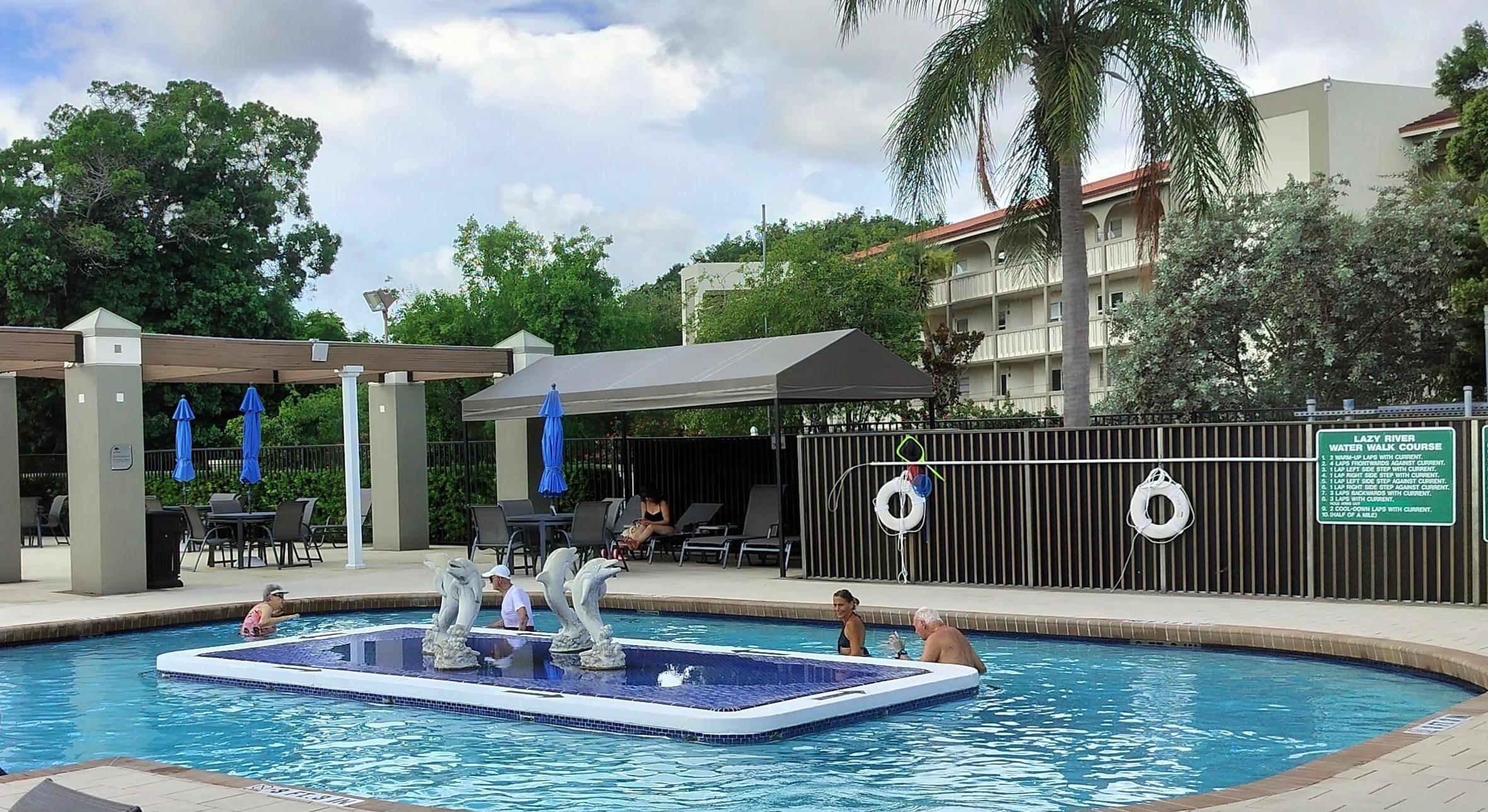 1904 Bermuda Circle, Unit H1 Coconut Creek, FL 33066 - Photo 67 of 72 Walking Pool at Wynmoor