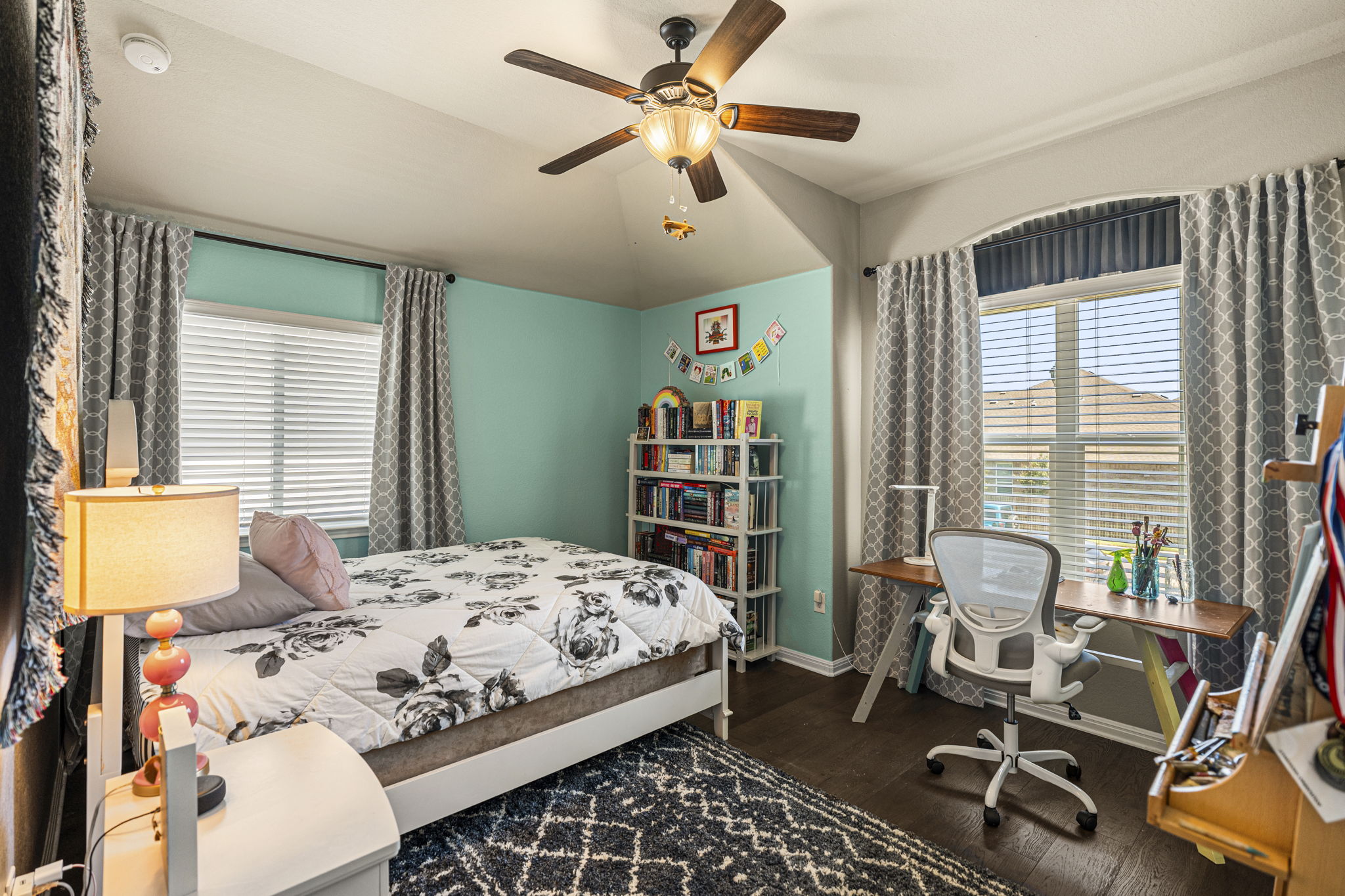 11412 Reading Way Austin, TX 78717 - Photo 17 of 35 Secondary bedroom upstairs with ceiling fan and walk in closet.