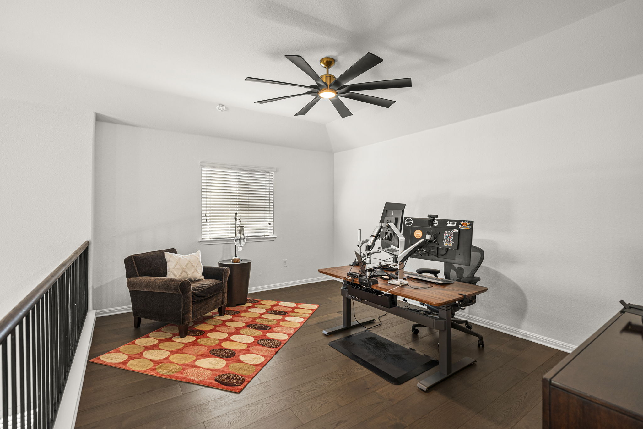 11412 Reading Way Austin, TX 78717 - Photo 22 of 35 Upstairs loft/office with recent wood floors and ceiling fan.