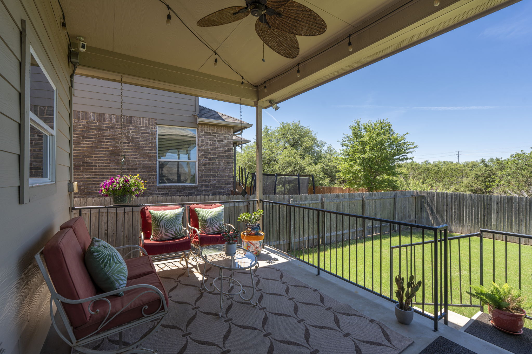 11412 Reading Way Austin, TX 78717 - Photo 24 of 35 Covered patio overlooking the back yard and greenbelt view.
