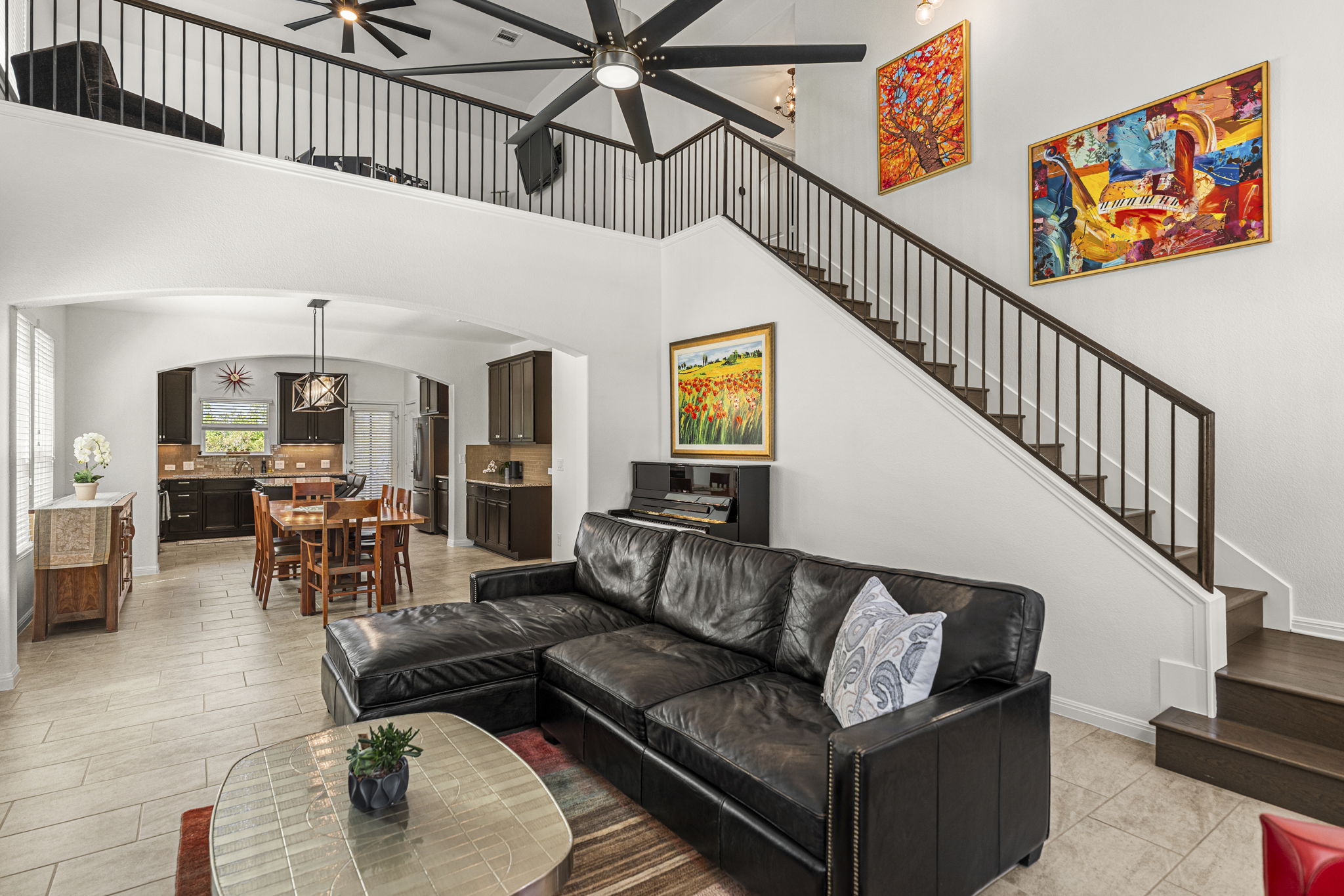 11412 Reading Way Austin, TX 78717 - Photo 5 of 35 Living room with solid tile flooring and high ceilings.