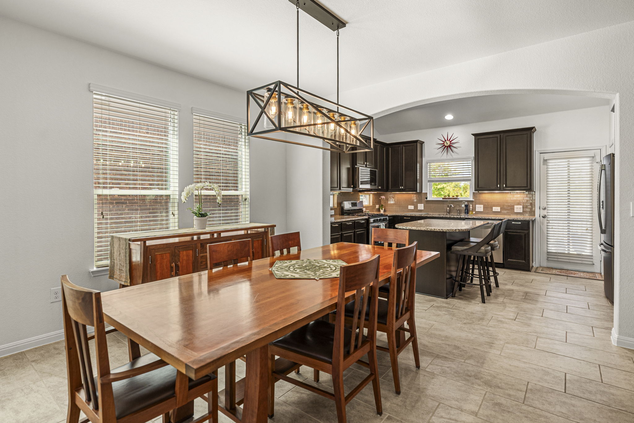 11412 Reading Way Austin, TX 78717 - Photo 7 of 35 Dining area in the heart of the home and is open to kitchen and living room.