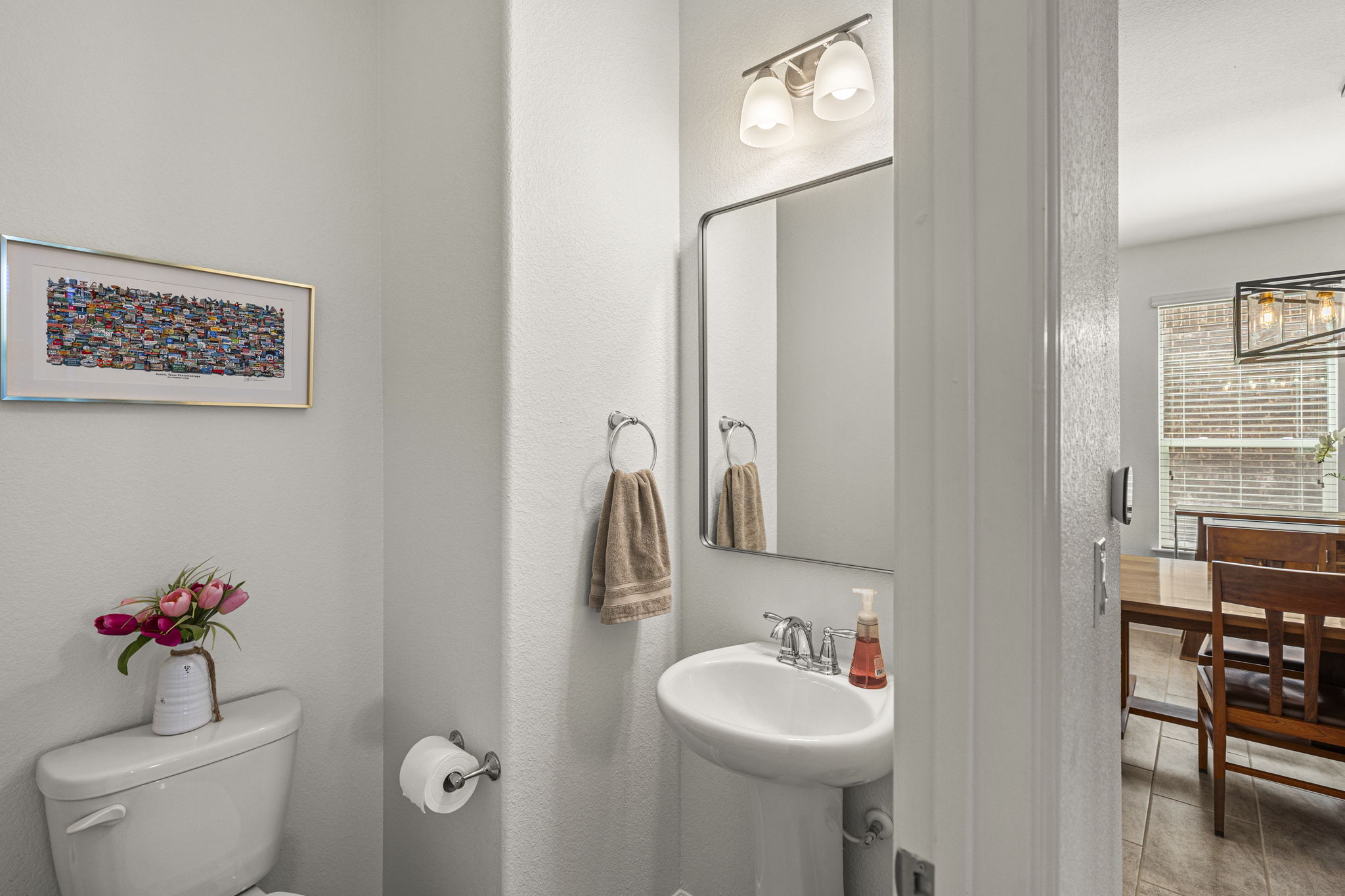 11412 Reading Way Austin, TX 78717 - Photo 9 of 35 Half bathroom downstairs.