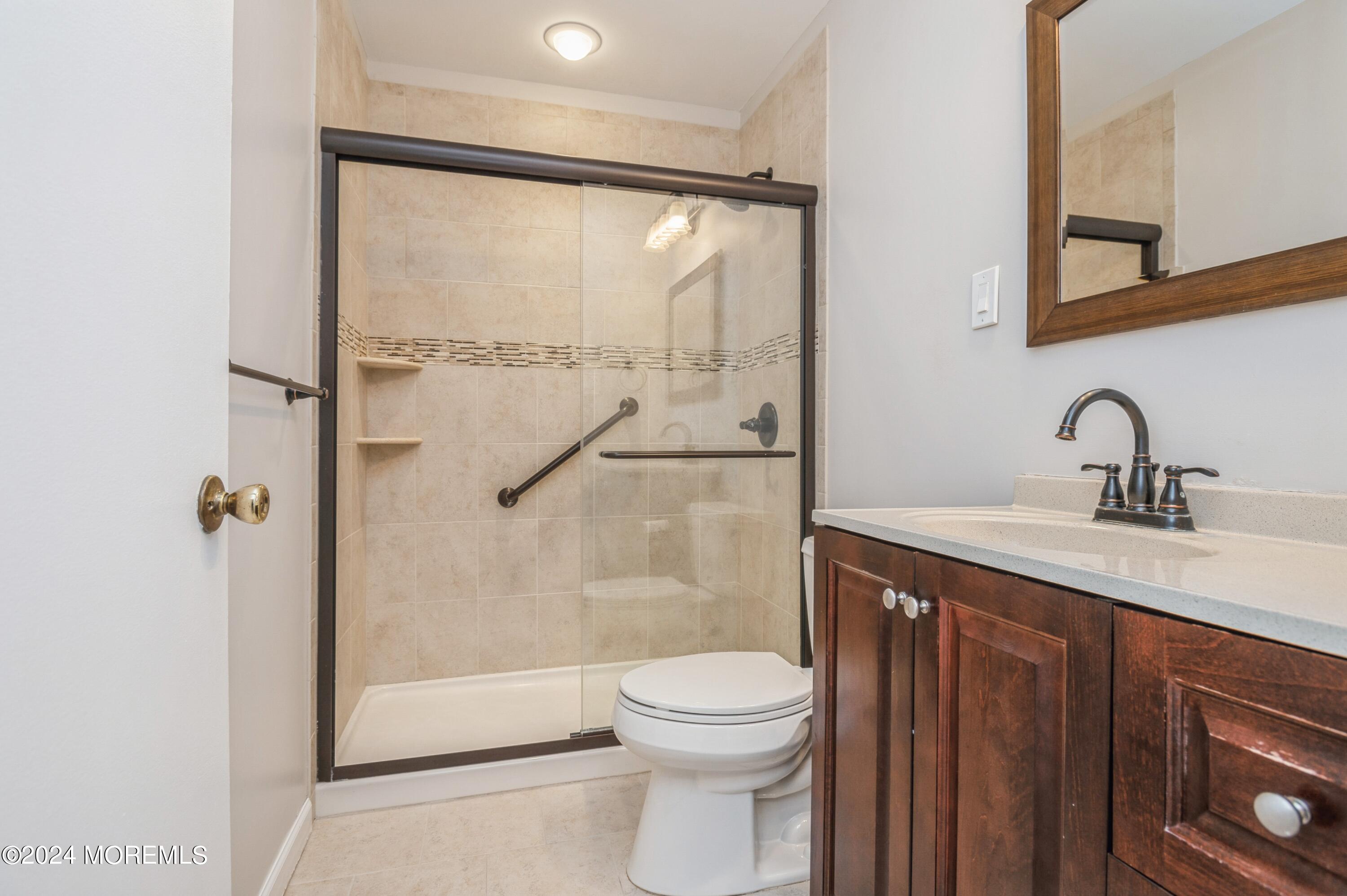 95 Halls Croft Road, Unit E Freehold, NJ 07728 - Photo 13 of 23 18_95HallsCroftRd_UnitE_8_Bathroom_HiRes
