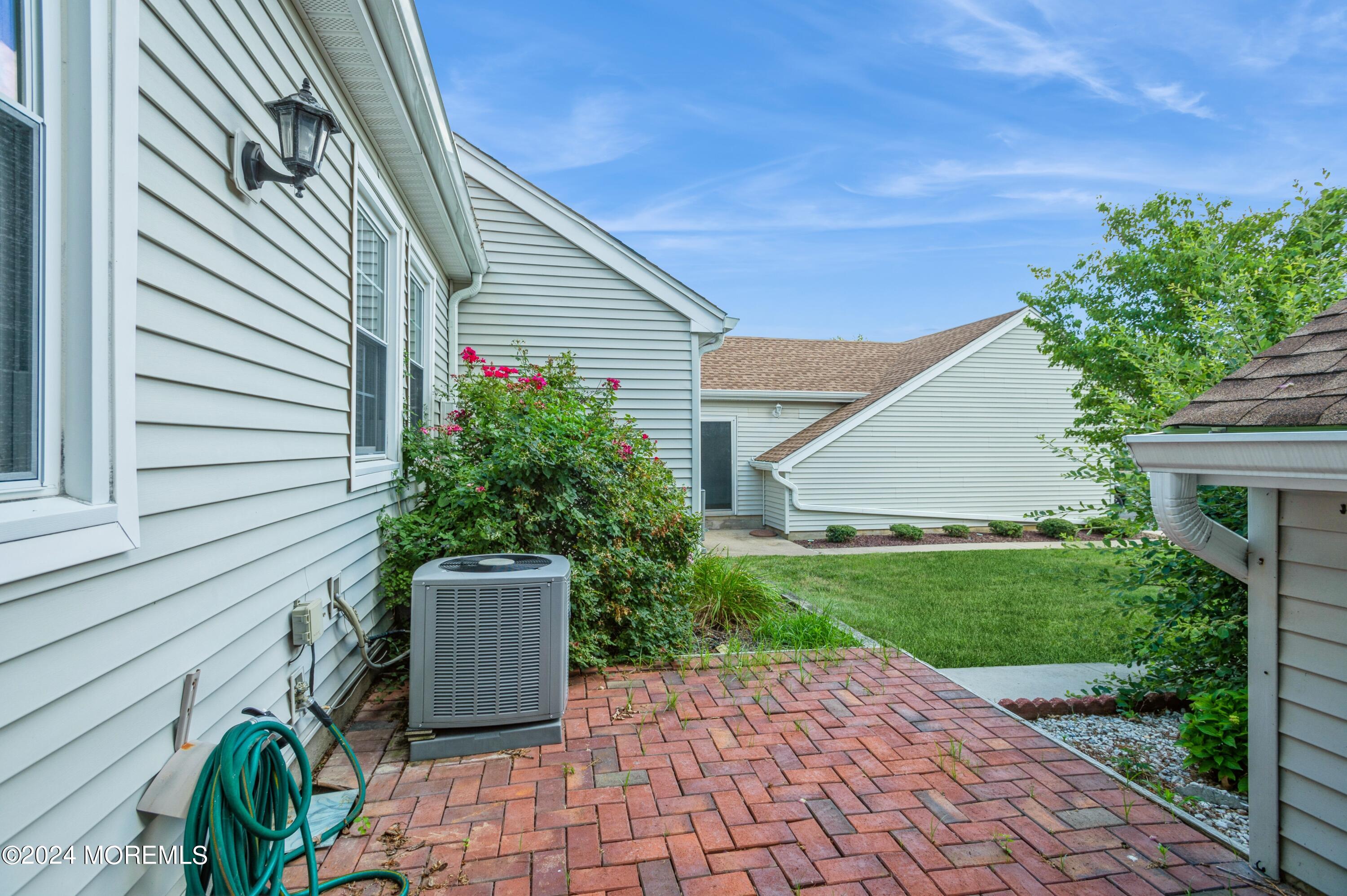 95 Halls Croft Road, Unit E Freehold, NJ 07728 - Photo 20 of 23 20_95HallsCroftRd_UnitE_85_Patio_HiRes