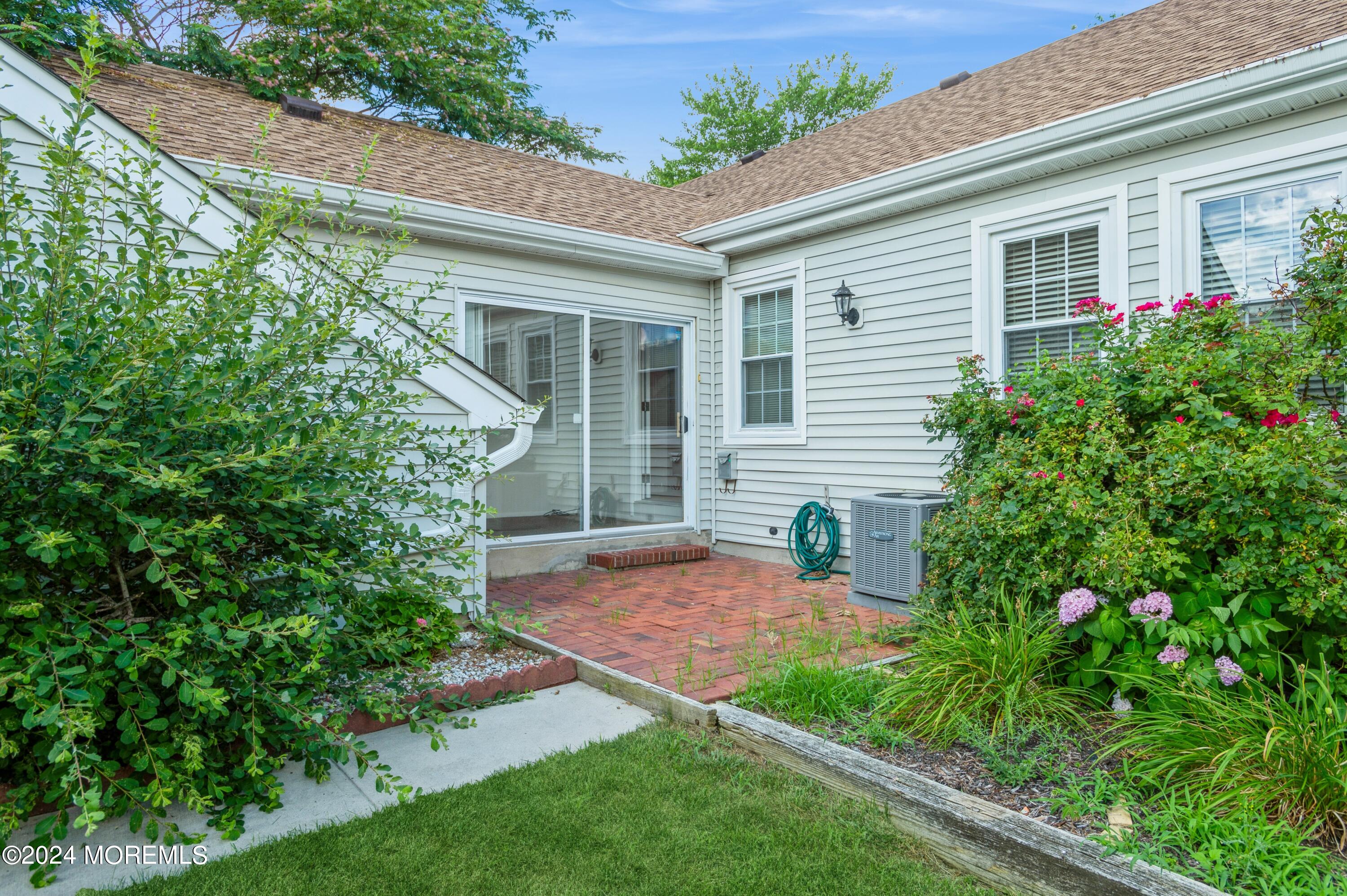 95 Halls Croft Road, Unit E Freehold, NJ 07728 - Photo 21 of 23 21_95HallsCroftRd_UnitE_85001_Patio_HiRe