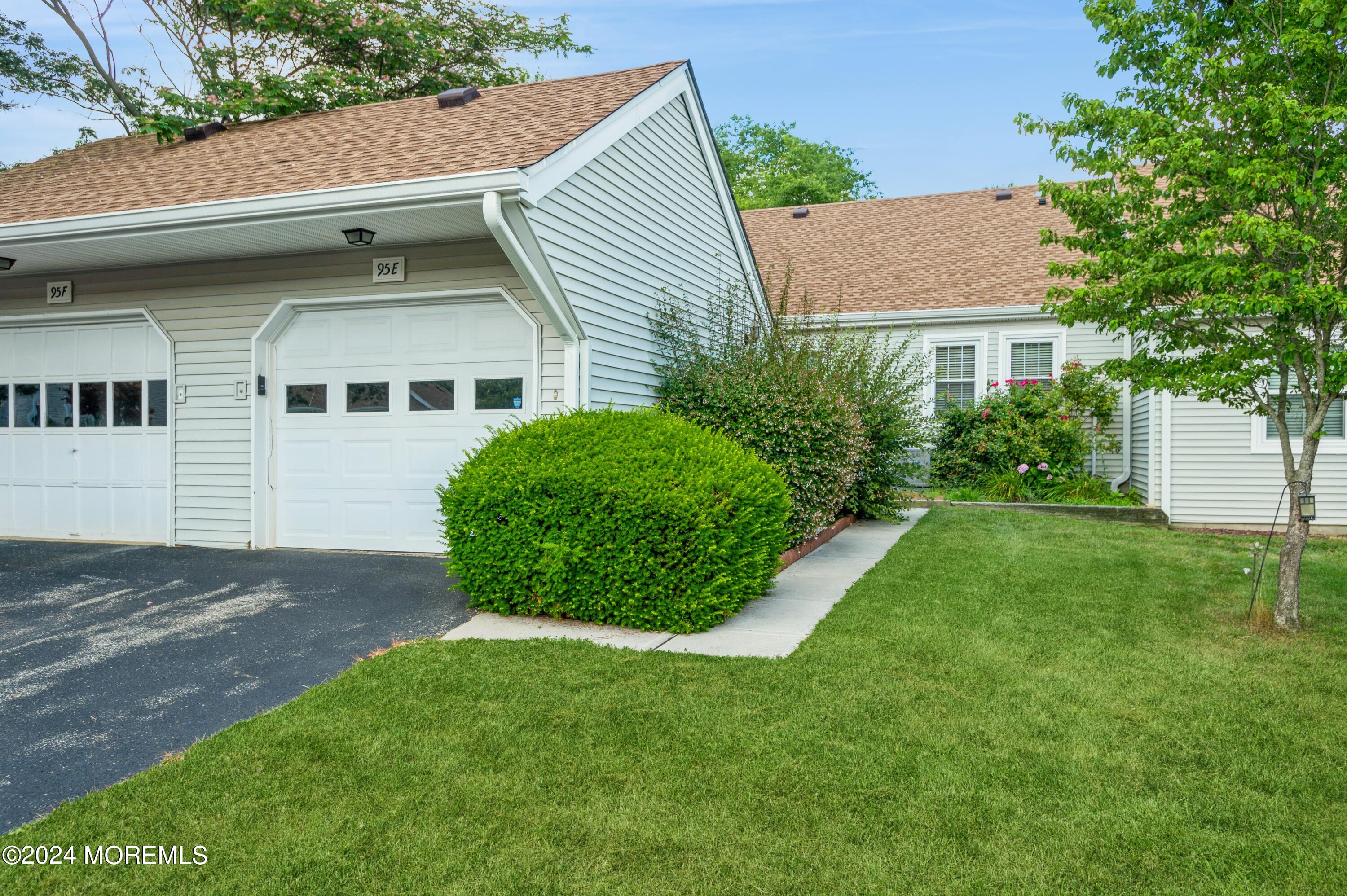 95 Halls Croft Road, Unit E Freehold, NJ 07728 - Photo 22 of 23 22_95HallsCroftRd_UnitE_35_Garage_HiRes