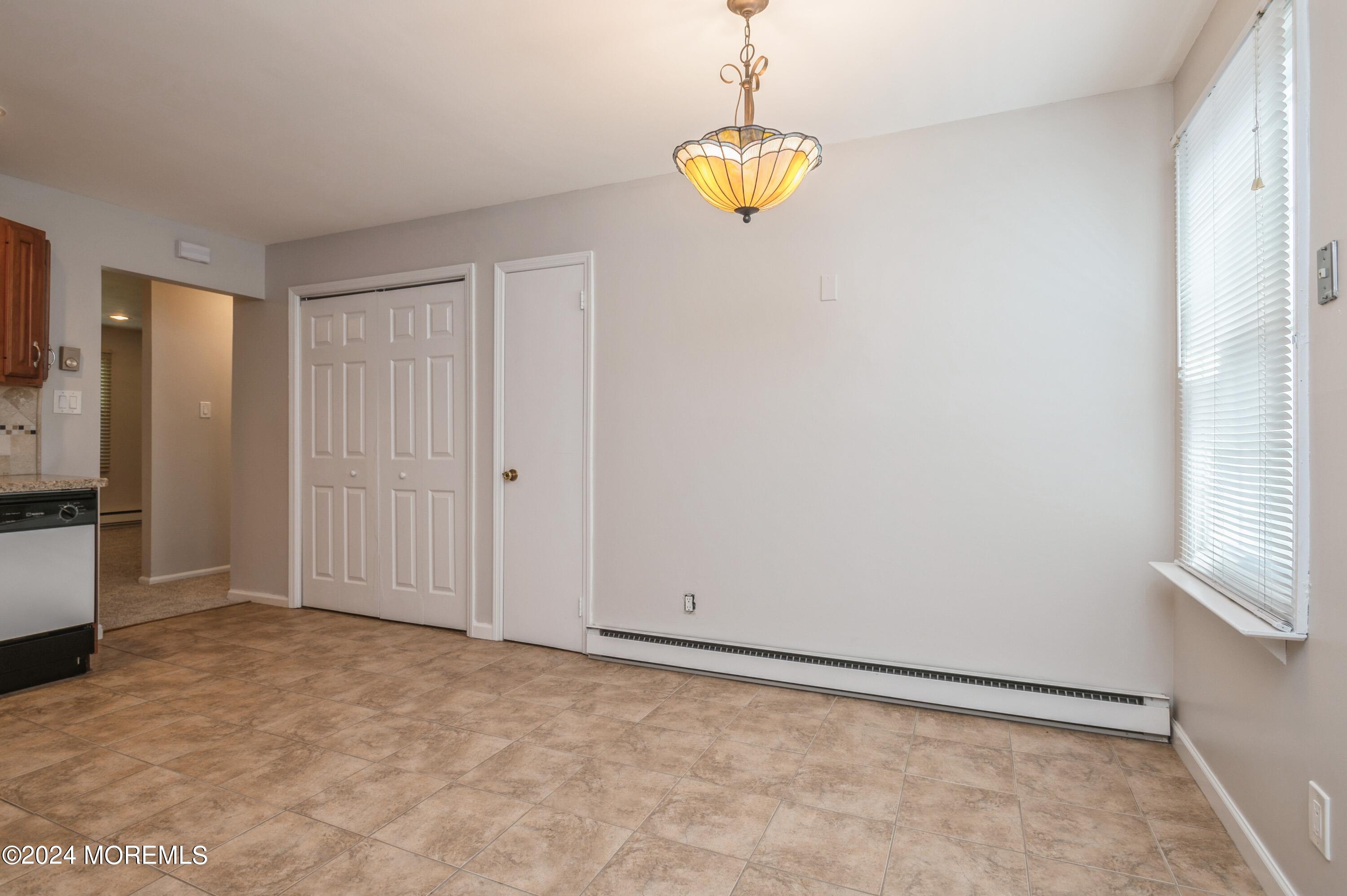 95 Halls Croft Road, Unit E Freehold, NJ 07728 - Photo 7 of 23 11_95HallsCroftRd_UnitE_359_BreakfastAre