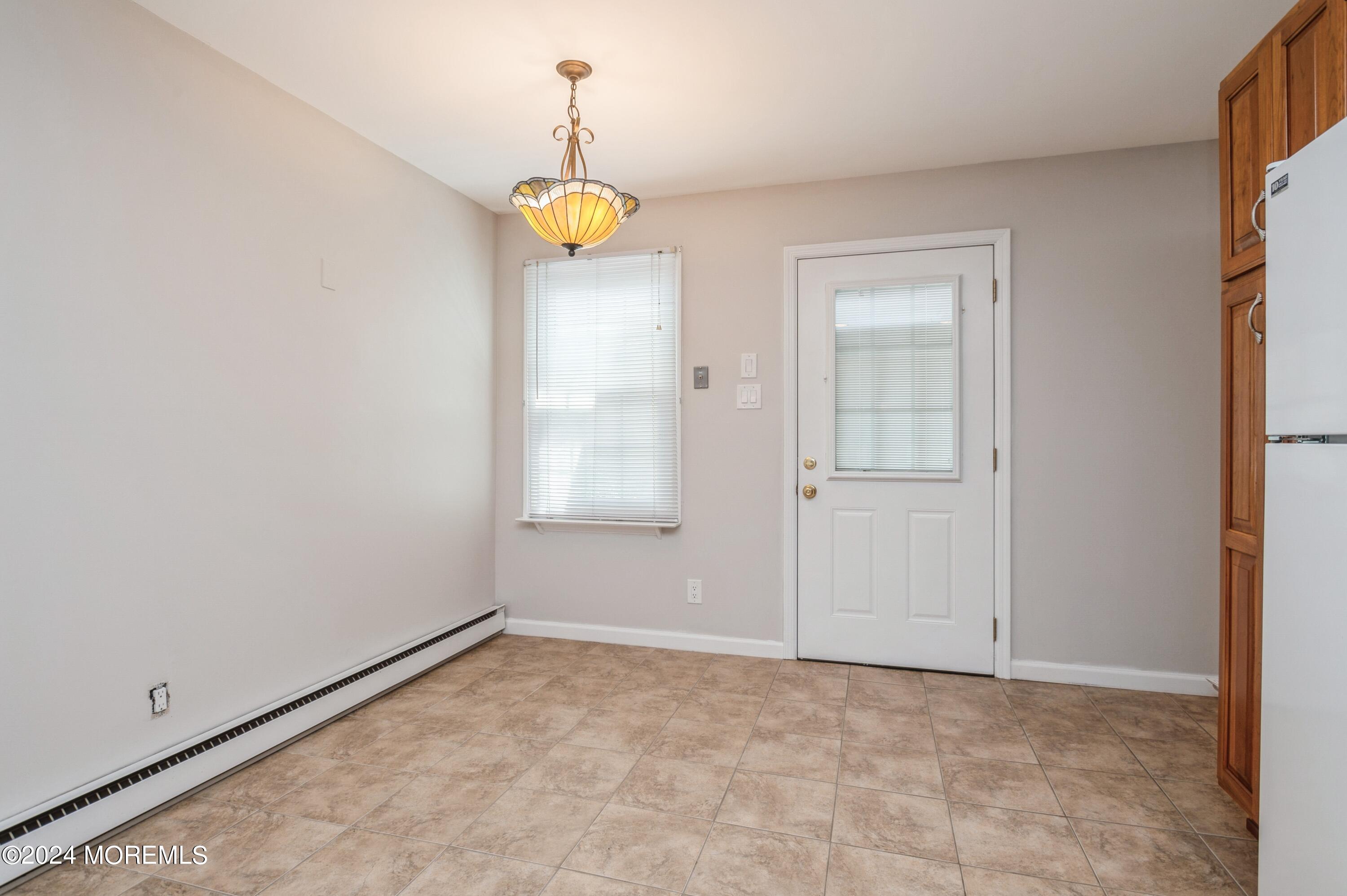 95 Halls Croft Road, Unit E Freehold, NJ 07728 - Photo 8 of 23 10_95HallsCroftRd_UnitE_358_BreakfastAre