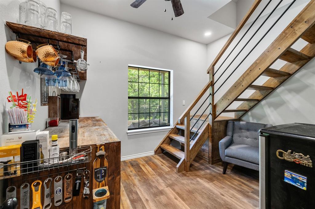 2668 Upper Montague Road Bowie, TX 76230 - Photo 20 of 40 a living room with furniture and a fireplace