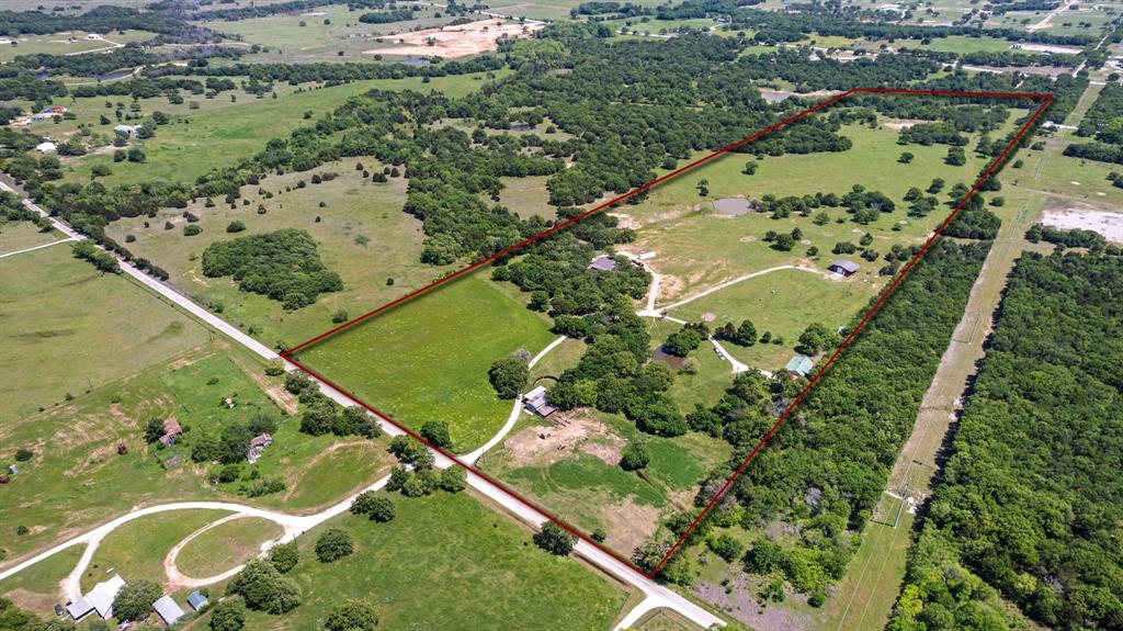 2668 Upper Montague Road Bowie, TX 76230 - Photo 2 of 40 an aerial view of a residential houses with outdoor space