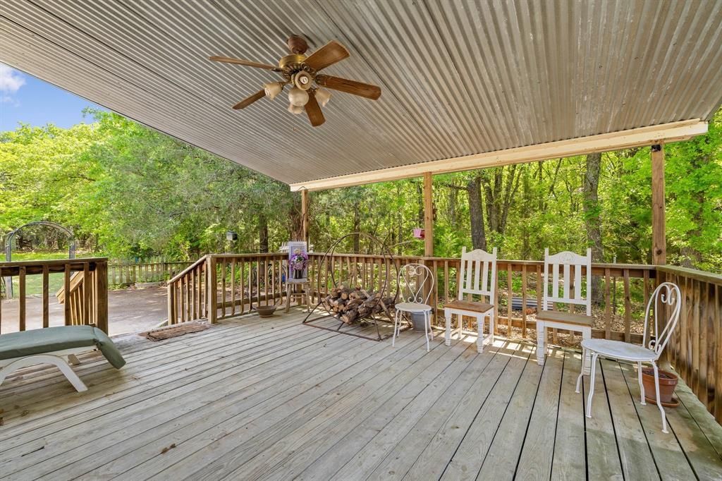 2668 Upper Montague Road Bowie, TX 76230 - Photo 33 of 40 a view of a balcony with wooden floor