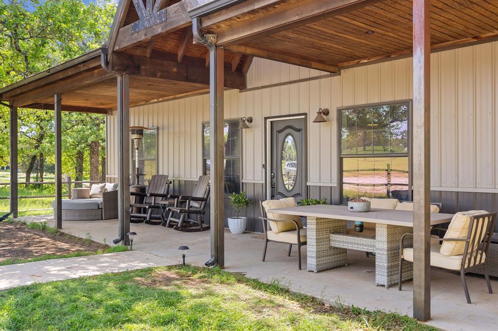 2668 Upper Montague Road Bowie, TX 76230 - Photo 4 of 40 a outdoor space with chairs