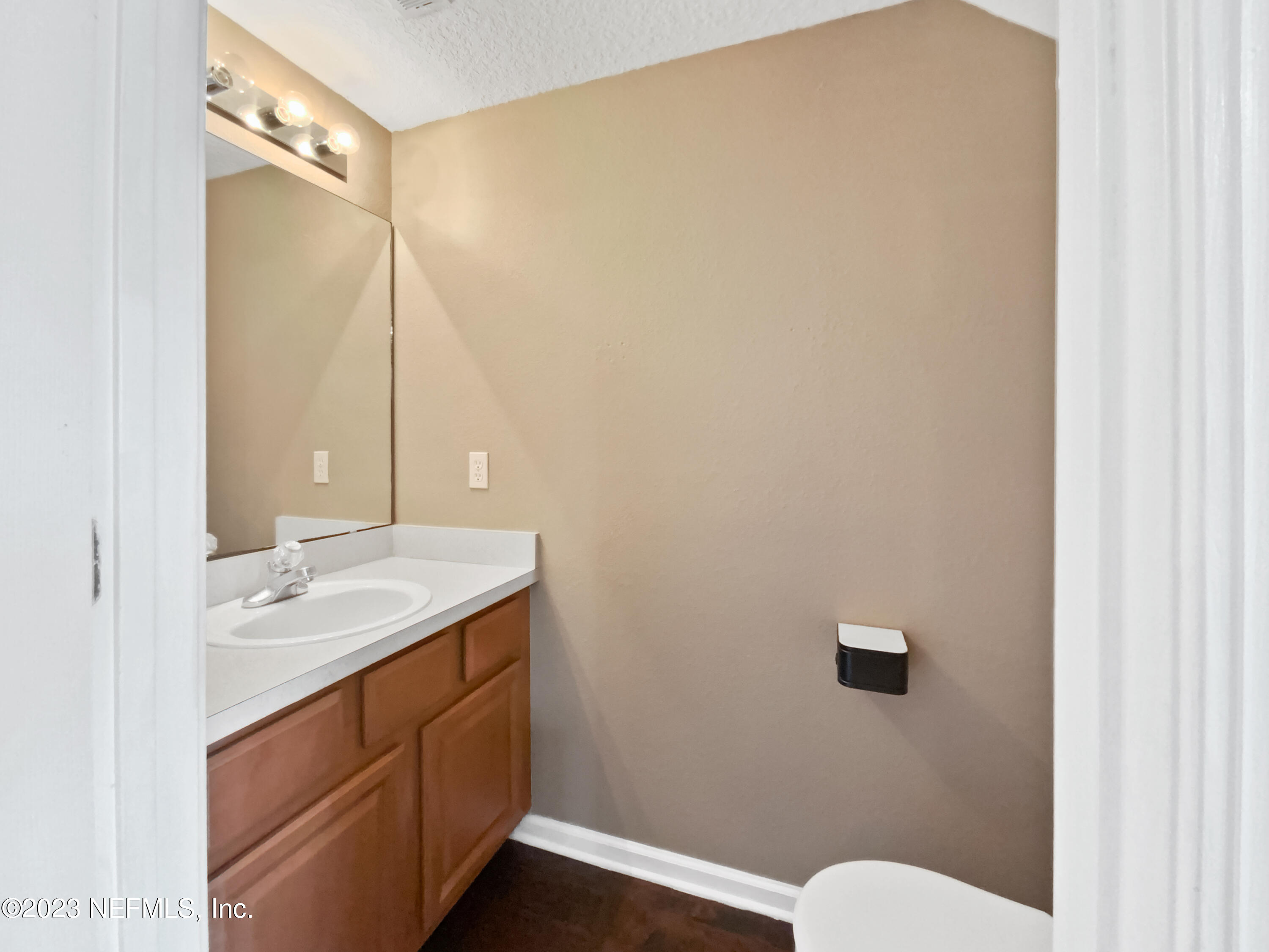 763 Scrub Jay Drive St. Augustine, FL 32092 - Photo 11 of 28 a bathroom with a granite countertop sink toilet and shower