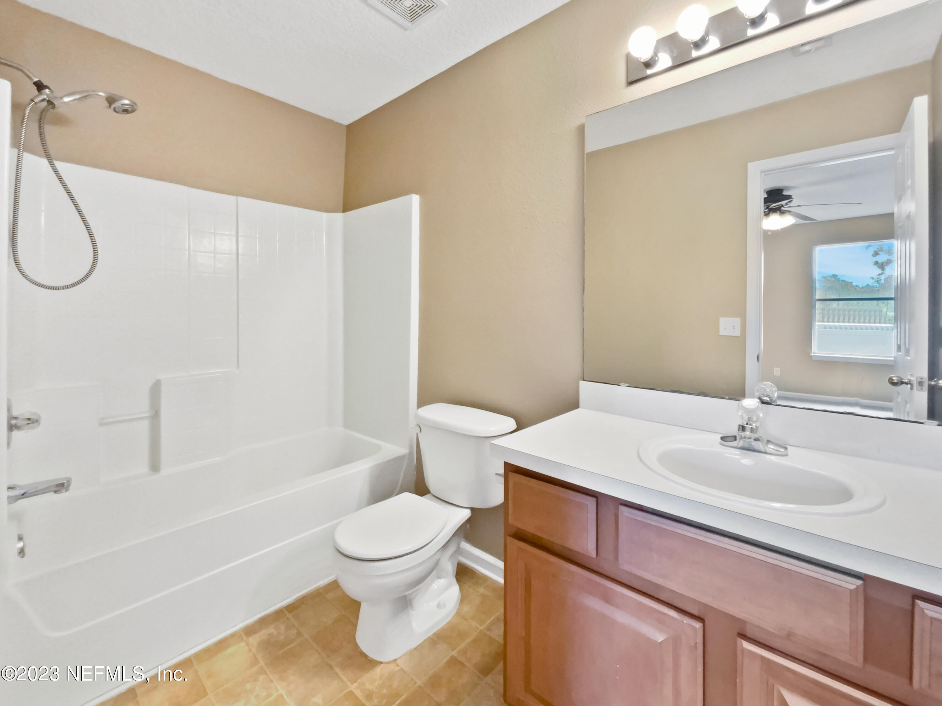 763 Scrub Jay Drive St. Augustine, FL 32092 - Photo 16 of 28 a bathroom with a sink toilet and shower