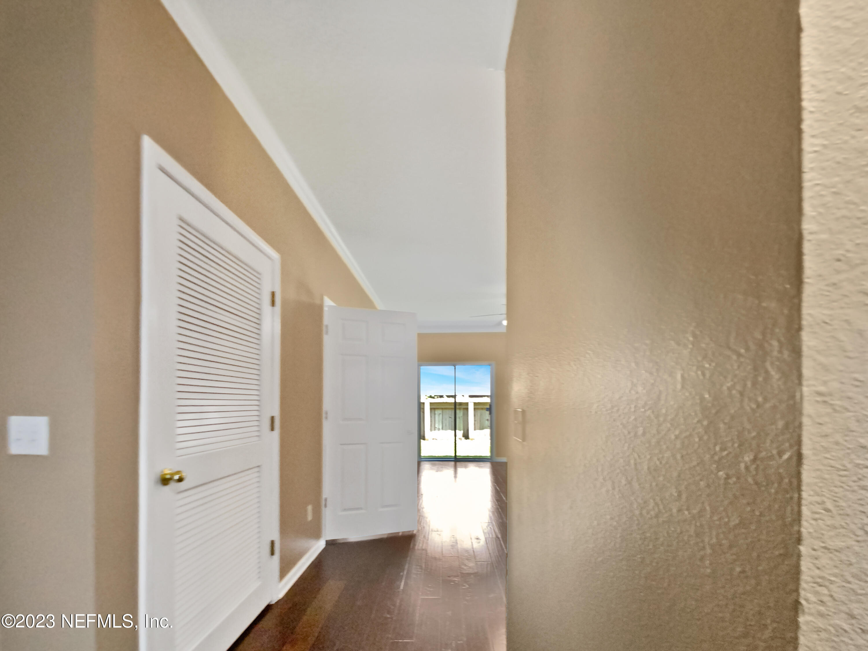 763 Scrub Jay Drive St. Augustine, FL 32092 - Photo 17 of 28 a view of hallway with wooden floor