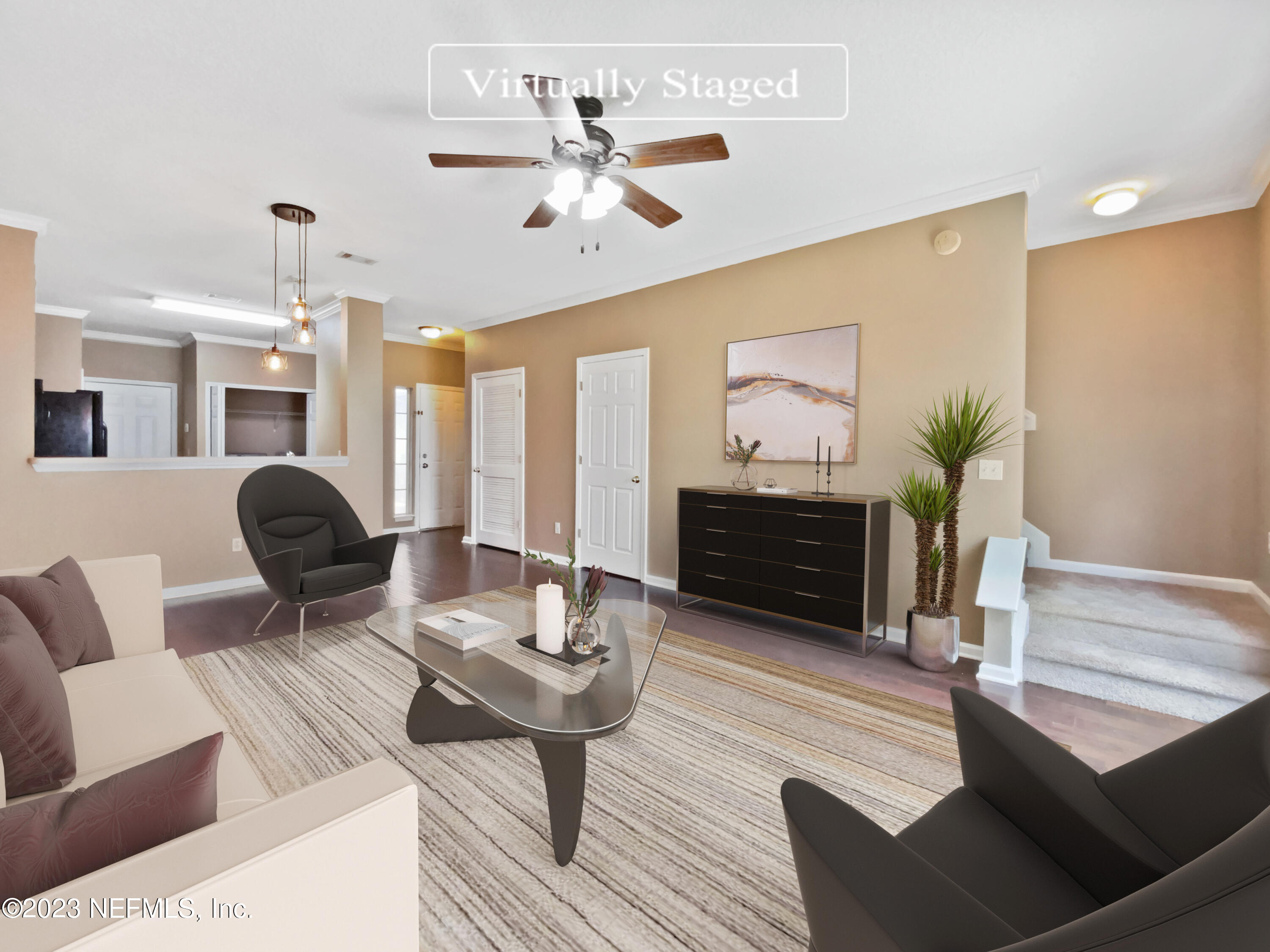 763 Scrub Jay Drive St. Augustine, FL 32092 - Photo 2 of 28 a living room with furniture and wooden floor