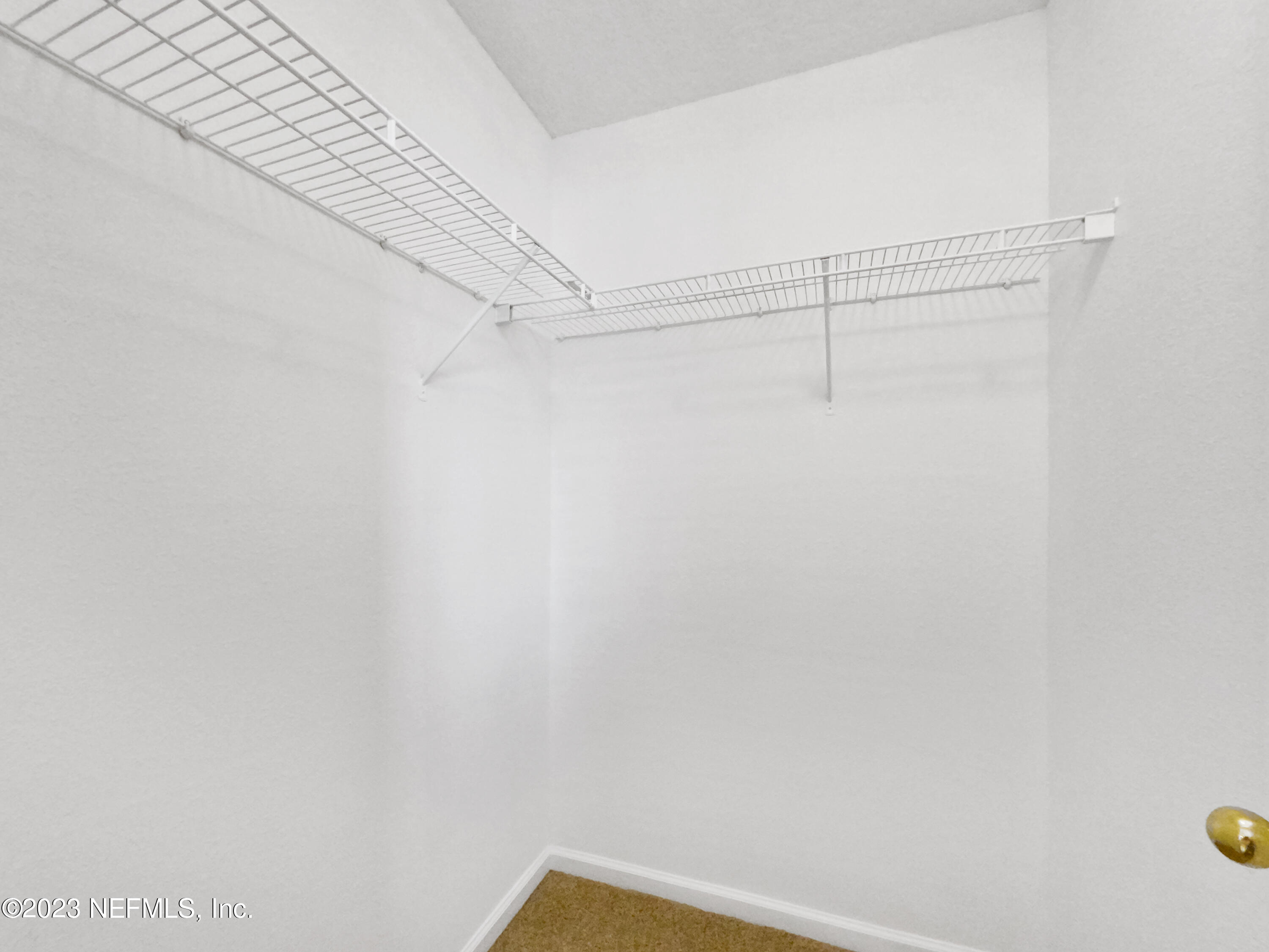 763 Scrub Jay Drive St. Augustine, FL 32092 - Photo 21 of 28 a view of a room with shelf
