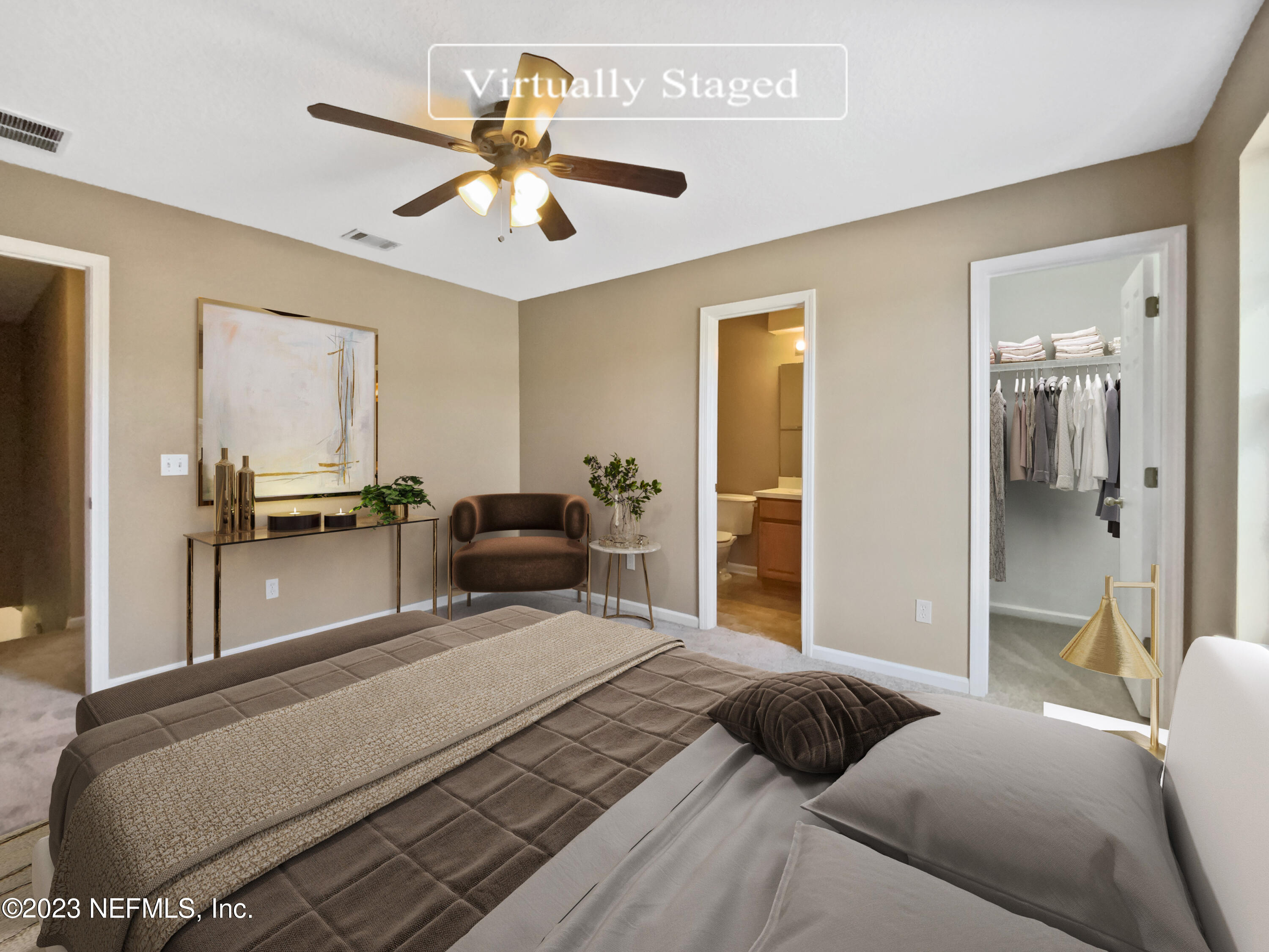 763 Scrub Jay Drive St. Augustine, FL 32092 - Photo 4 of 28 a bedroom with a bed and ceiling fan