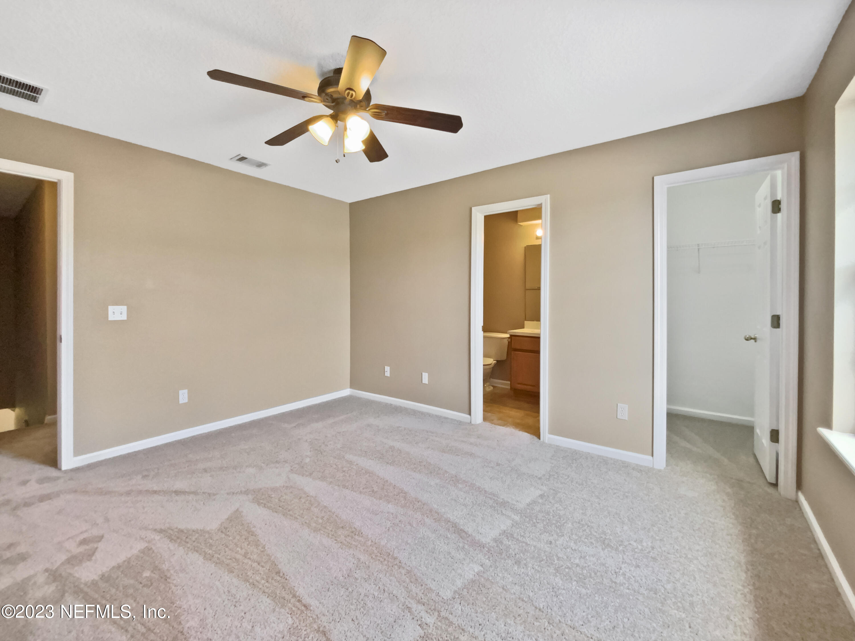 763 Scrub Jay Drive St. Augustine, FL 32092 - Photo 5 of 28 a view of an empty room with window