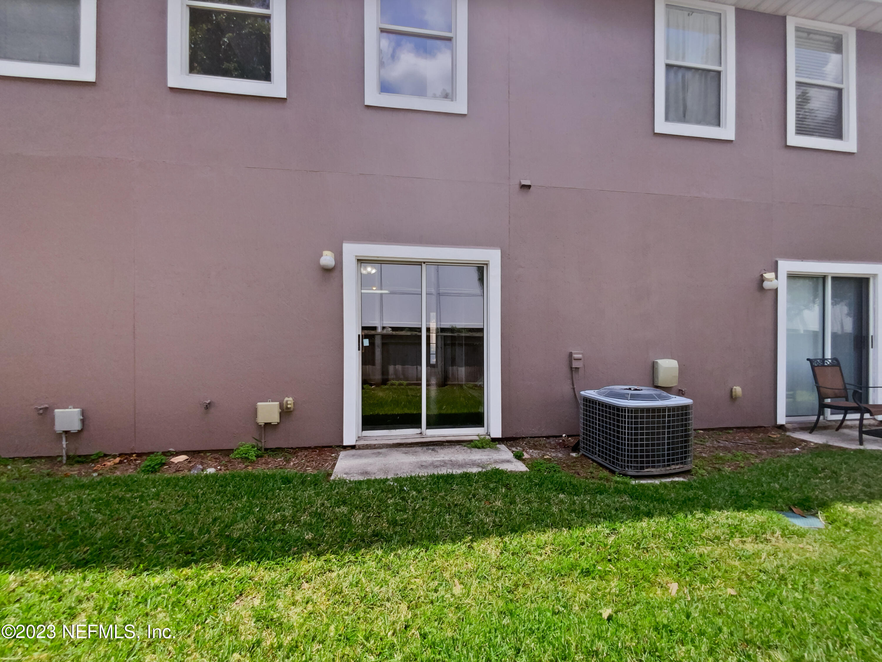 763 Scrub Jay Drive St. Augustine, FL 32092 - Photo 9 of 28 front view of a house with a yard